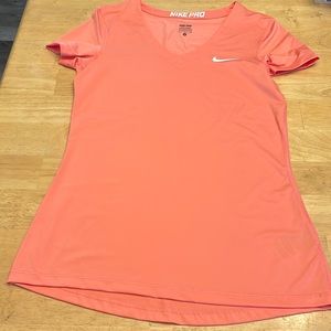 Peach Nike Pro short sleeve shirt